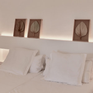 Serena Sol Apartments Detail of the decoration of the headboard of the double bed